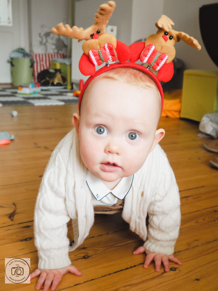 Baby wearing Christmas headband