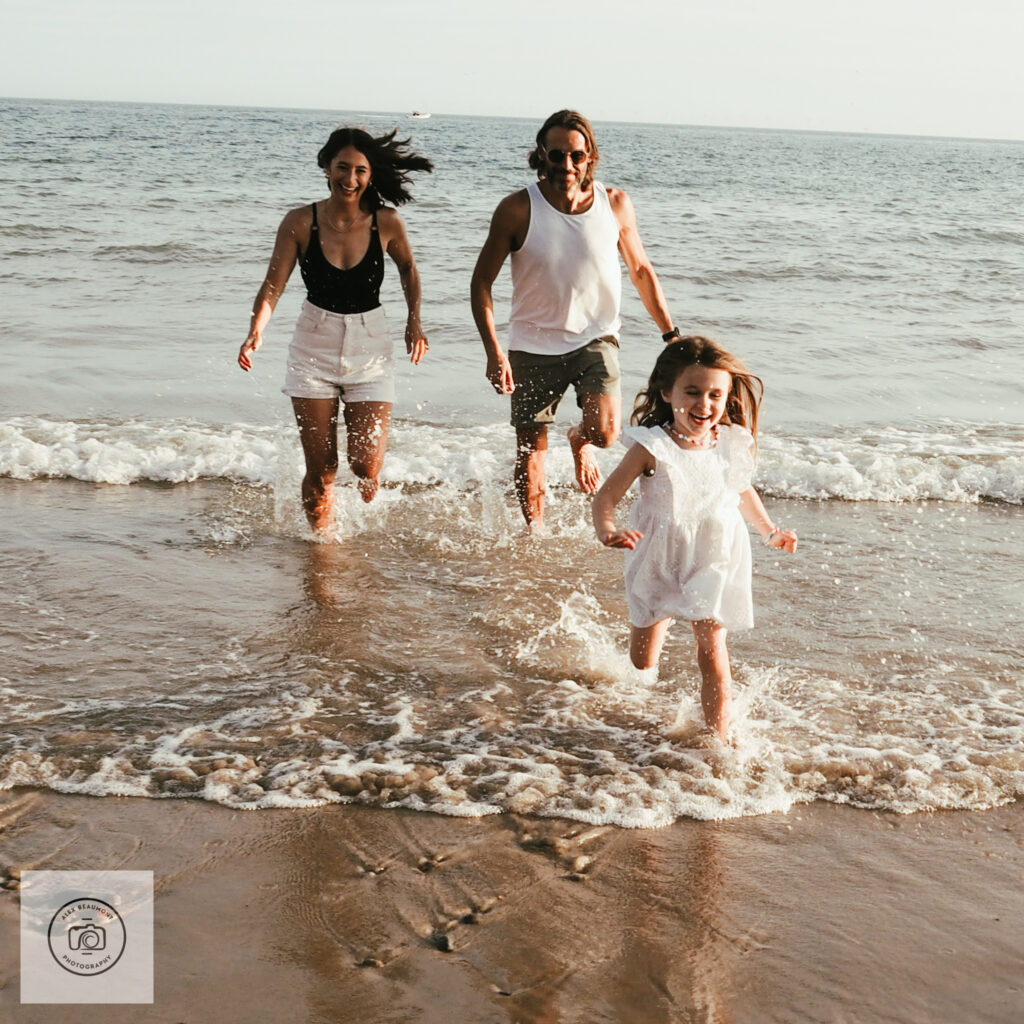 fun family photoshoot on the beach